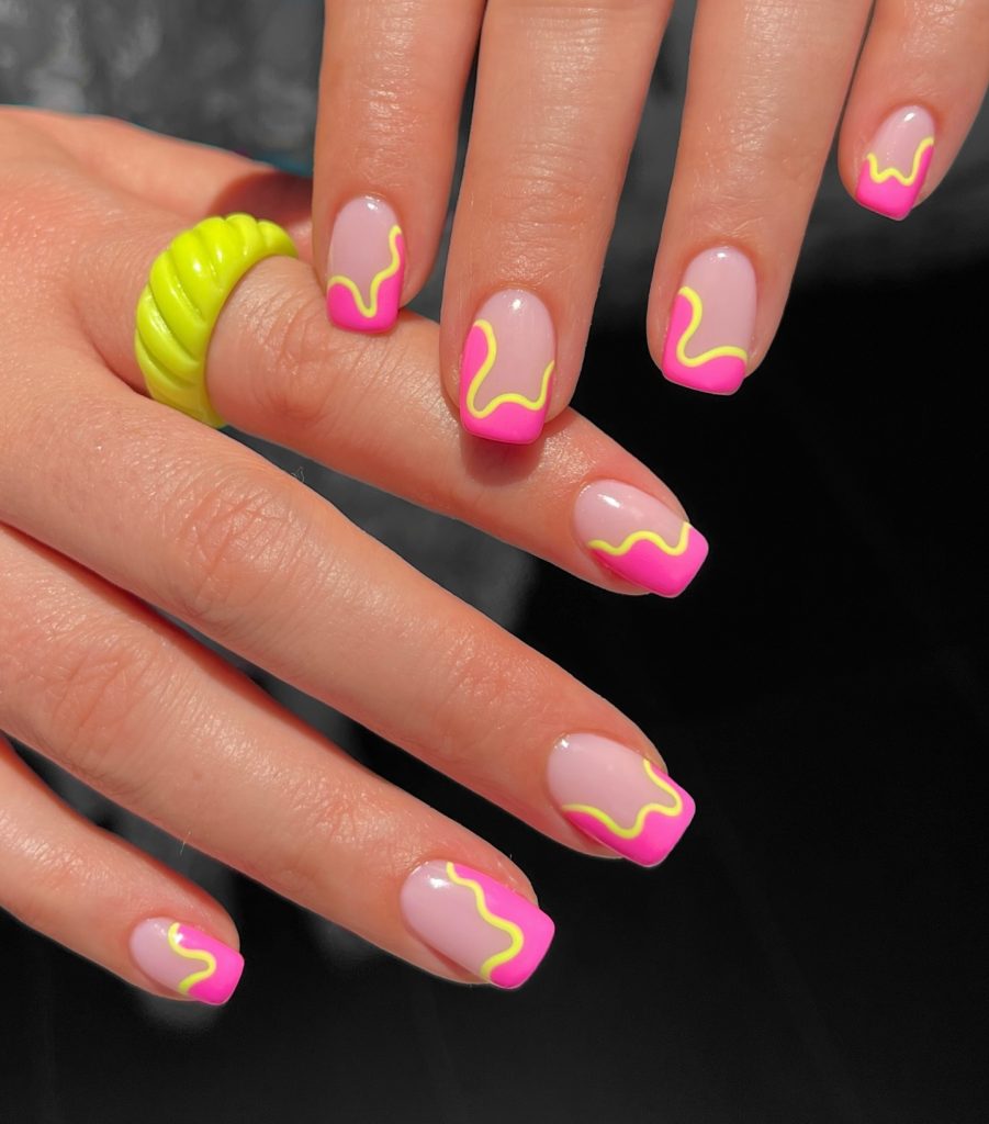 pink and yellow swirl nails