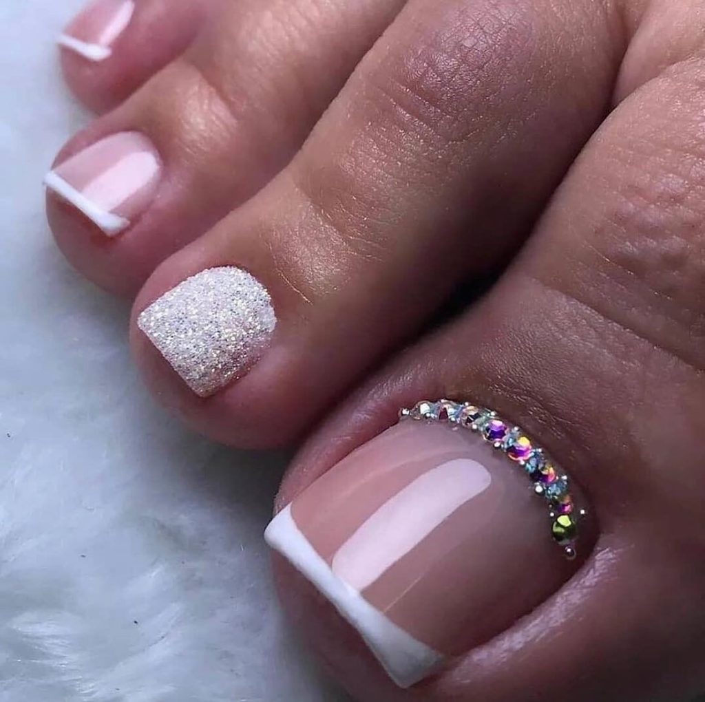 white tow nails with glitter 