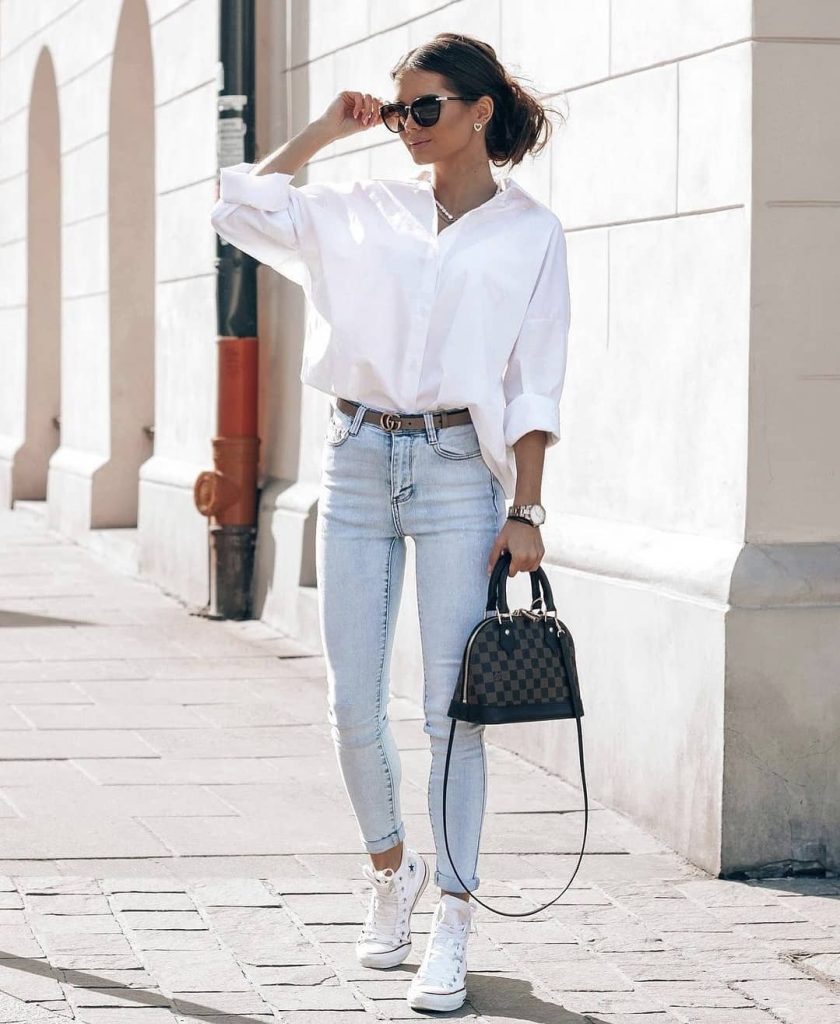 elegant light wash jean outfit
